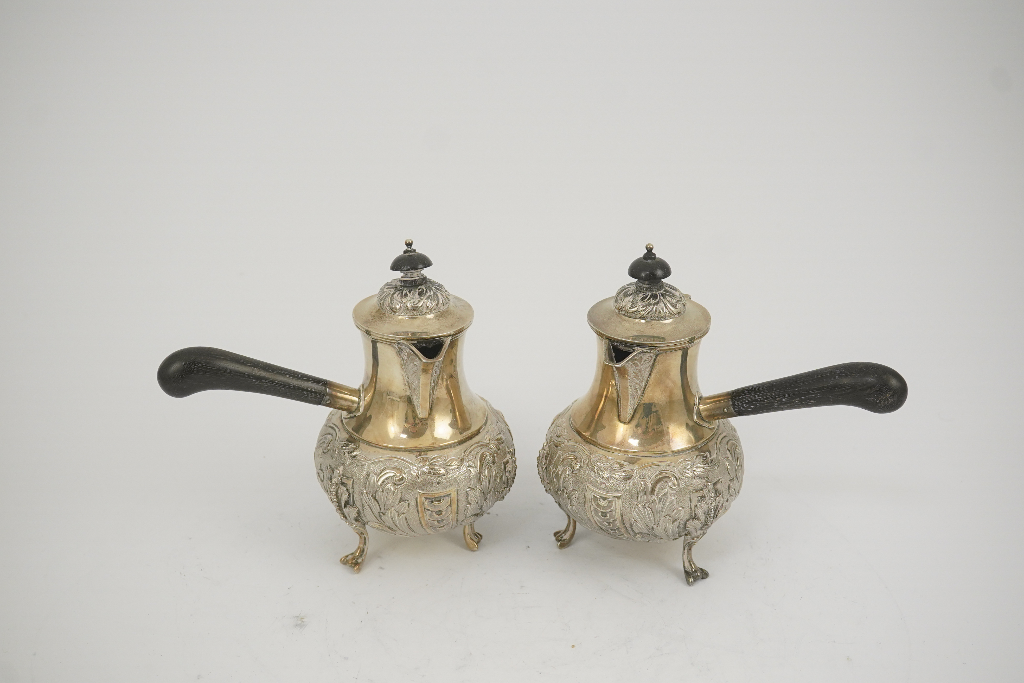 A pair of George V silver chocolate pots, by Goldsmiths & Silversmiths Co Ltd